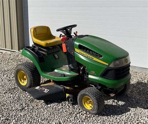 john deere 125 weight